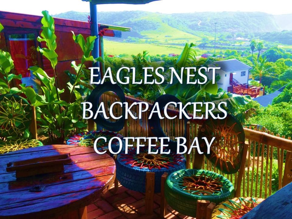 a sign that readsagles nest backyards coffee bay at Eagles Nest hostel plus self catering private units in Coffee Bay