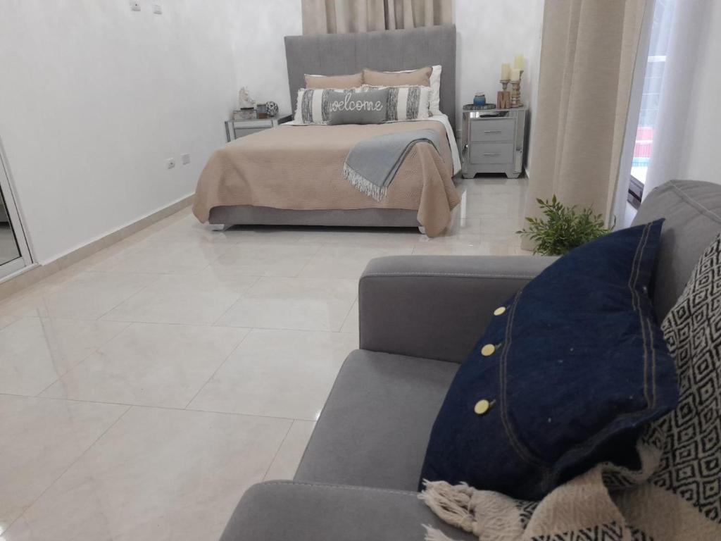 Postel nebo postele na pokoji v ubytování Villa Mónaco Jarabacoa RD