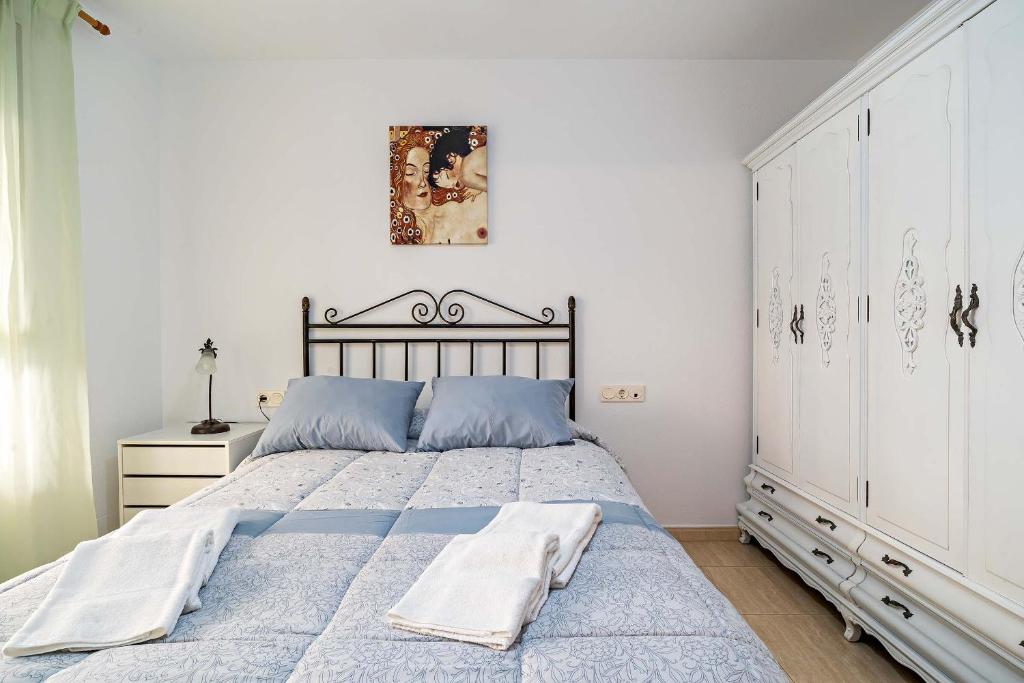 Posteľ alebo postele v izbe v ubytovaní Santa Ana Apartamento