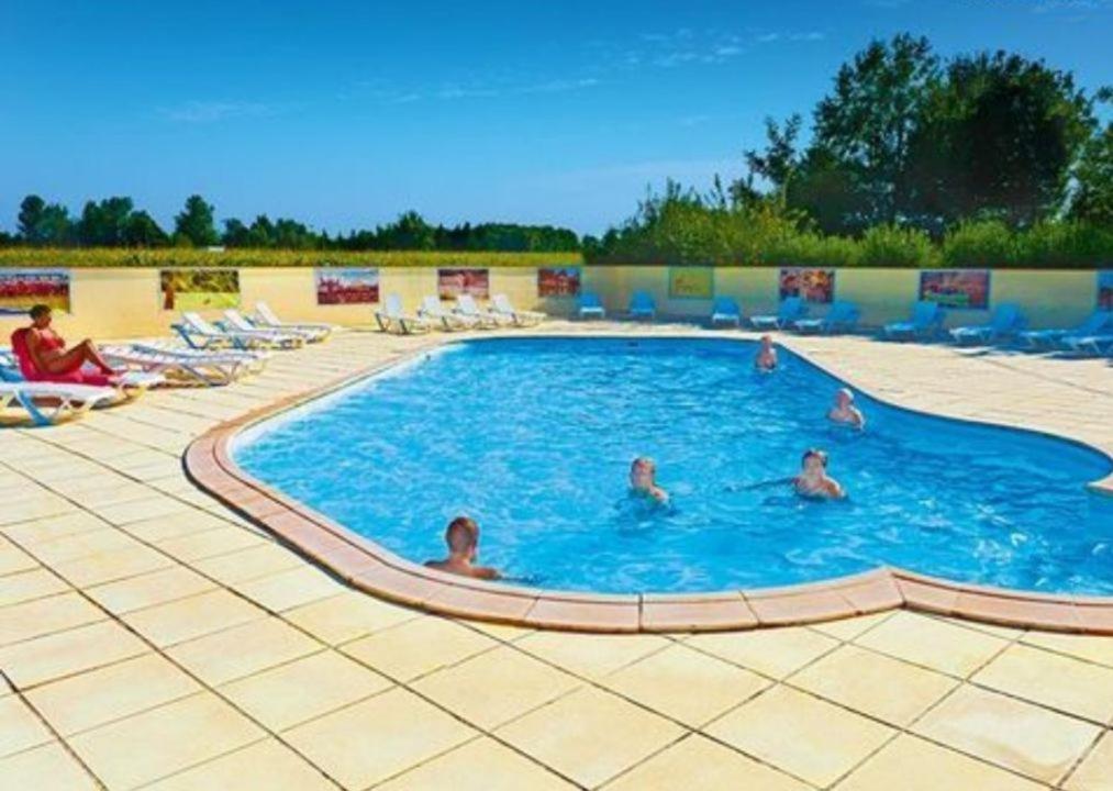 a group of people in a swimming pool at Mobile home in Boofzheim