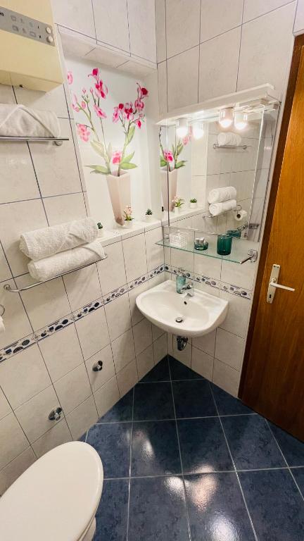Koupelna v ubytování Apartmens and Rooms Madunic V
