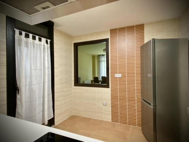 a bathroom with a shower and a mirror at Mi Refugio in Arenas de San Pedro