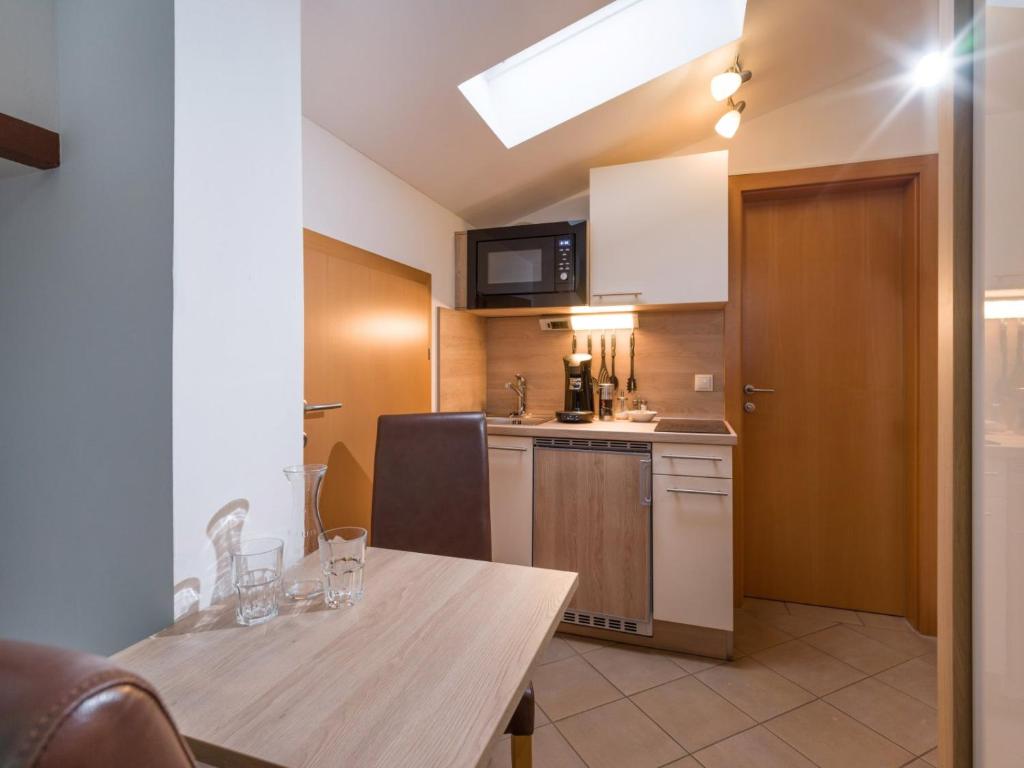 Kuchyň nebo kuchyňský kout v ubytování Blaiken Appartements in Scheffau am Wilden Kaiser