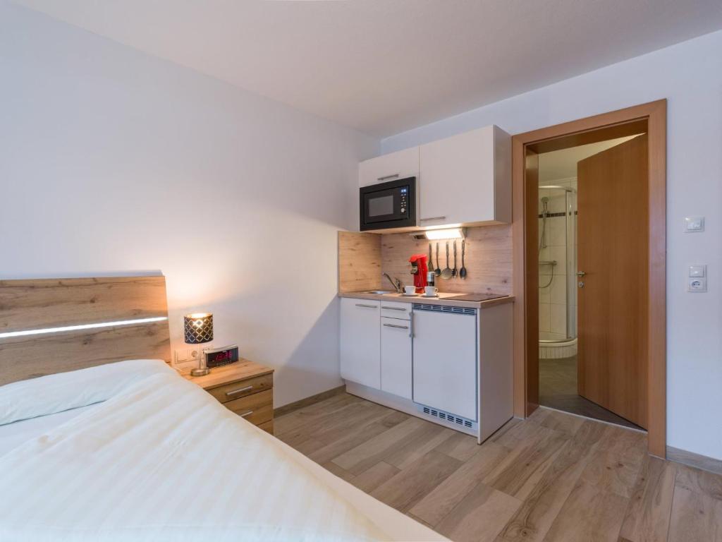 Kuchyň nebo kuchyňský kout v ubytování Blaiken Appartements in Scheffau am Wilden Kaiser