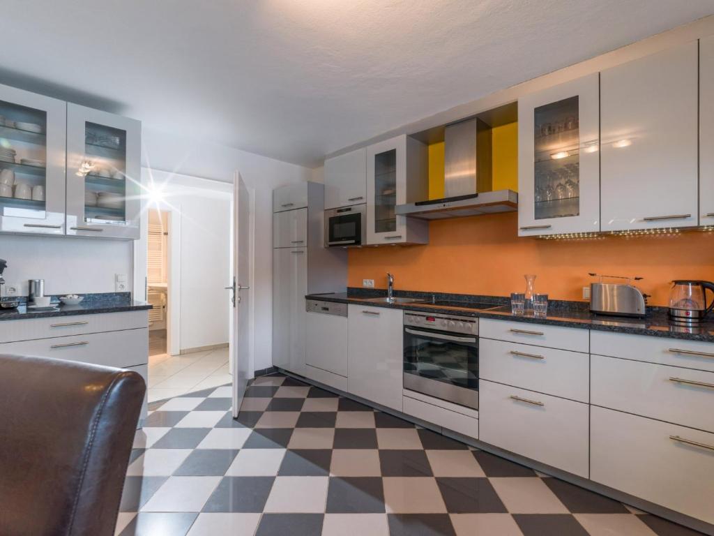 Kuchyň nebo kuchyňský kout v ubytování Blaiken Appartements in Scheffau am Wilden Kaiser