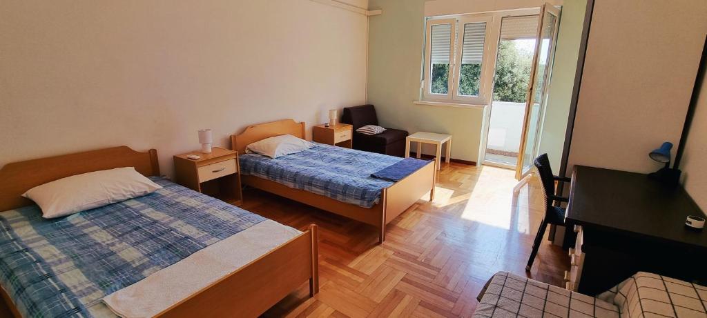 Posteľ alebo postele v izbe v ubytovaní Apartment O.K.