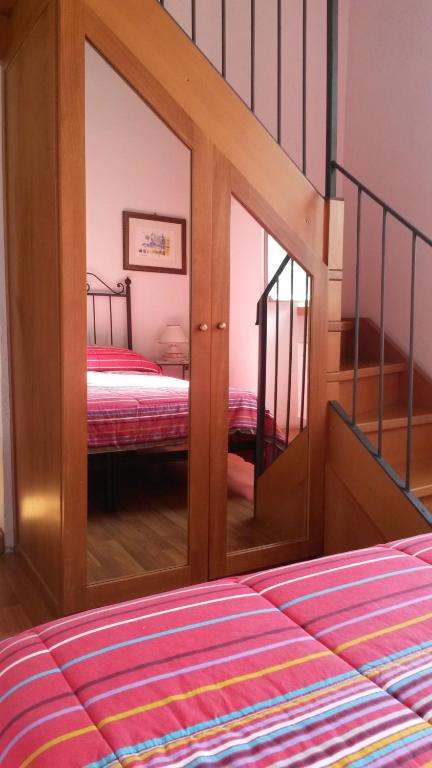Postel nebo postele na pokoji v ubytování Camere Carli