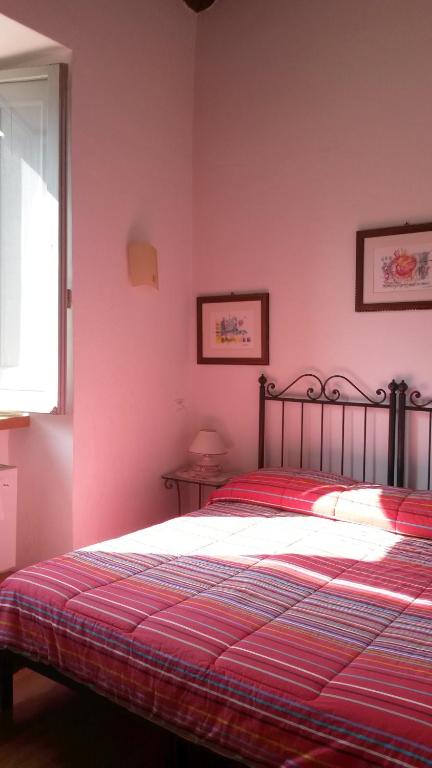 Postel nebo postele na pokoji v ubytování Camere Carli