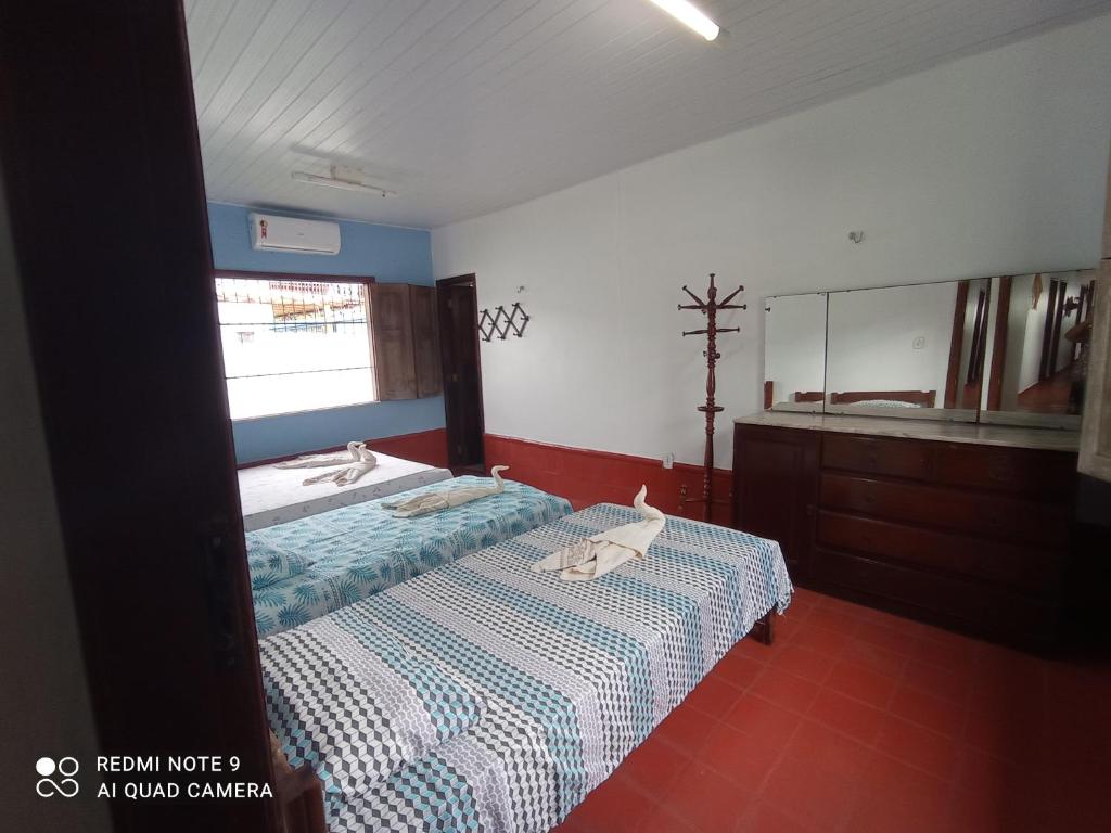 Postel nebo postele na pokoji v ubytování Casa Mineira