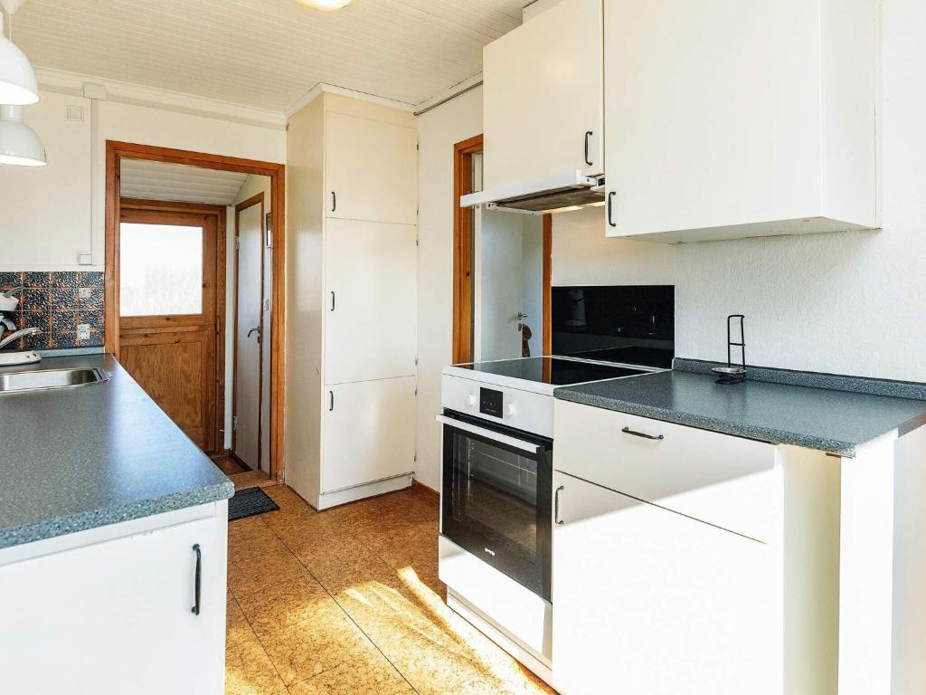Kuchyň nebo kuchyňský kout v ubytování Holiday home Vordingborg X