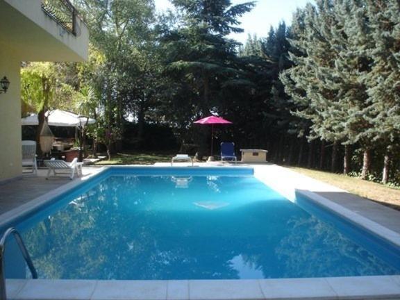 Bazén v ubytování B&B Rollo Garden nebo v jeho okolí