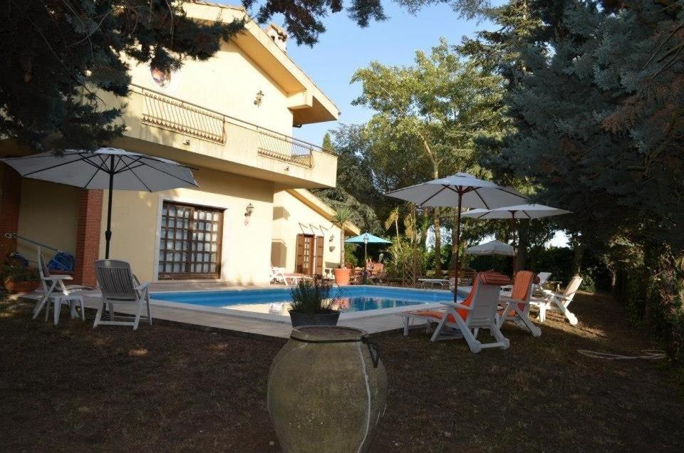Bazén v ubytování B&B Rollo Garden nebo v jeho okolí