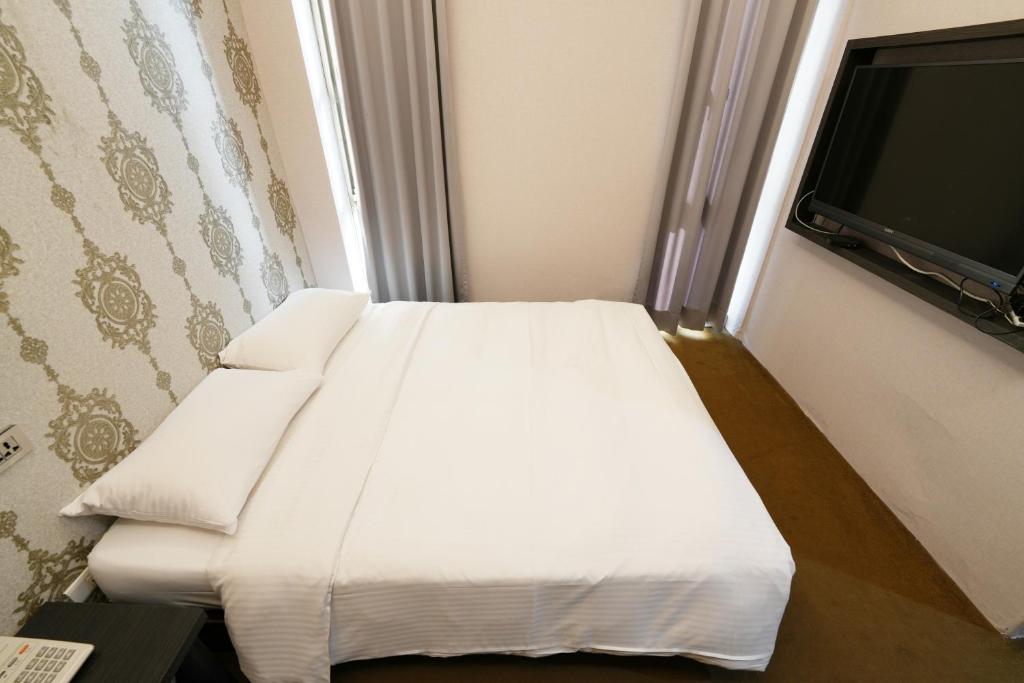 TV a/nebo společenská místnost v ubytování Meworld Hotel - Ximen