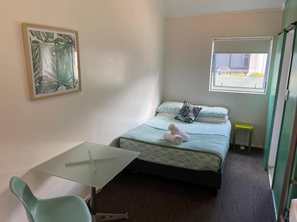 Letto o letti in una camera di Peppertree Lodge