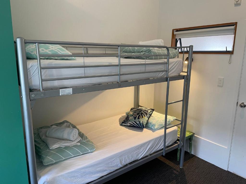 Letto o letti in una camera di Peppertree Lodge