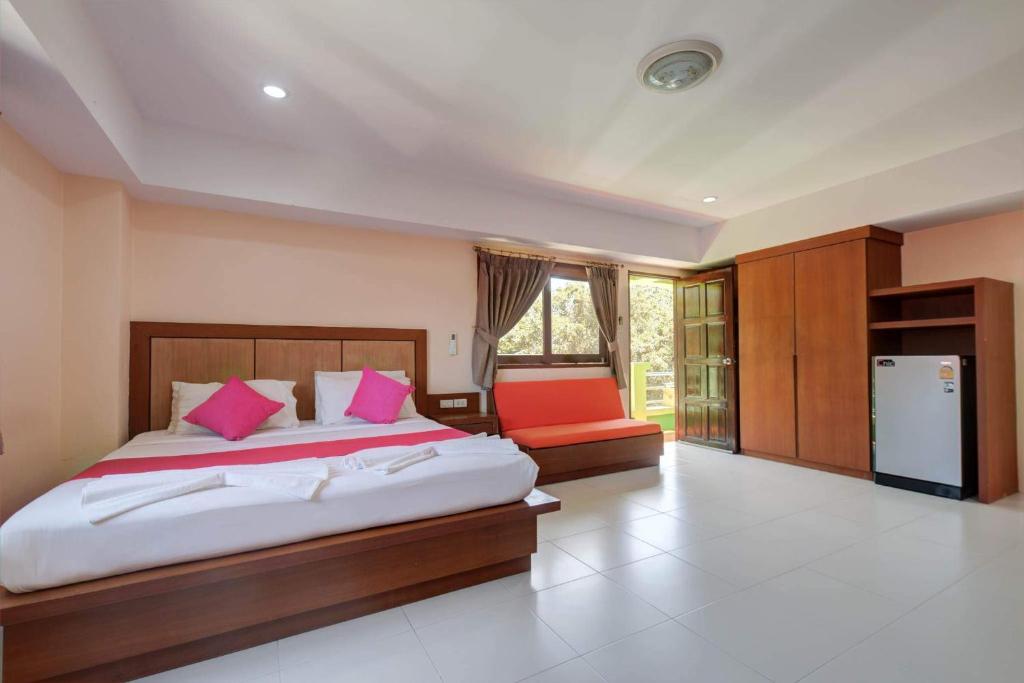Postel nebo postele na pokoji v ubytování Rak Samui Residence