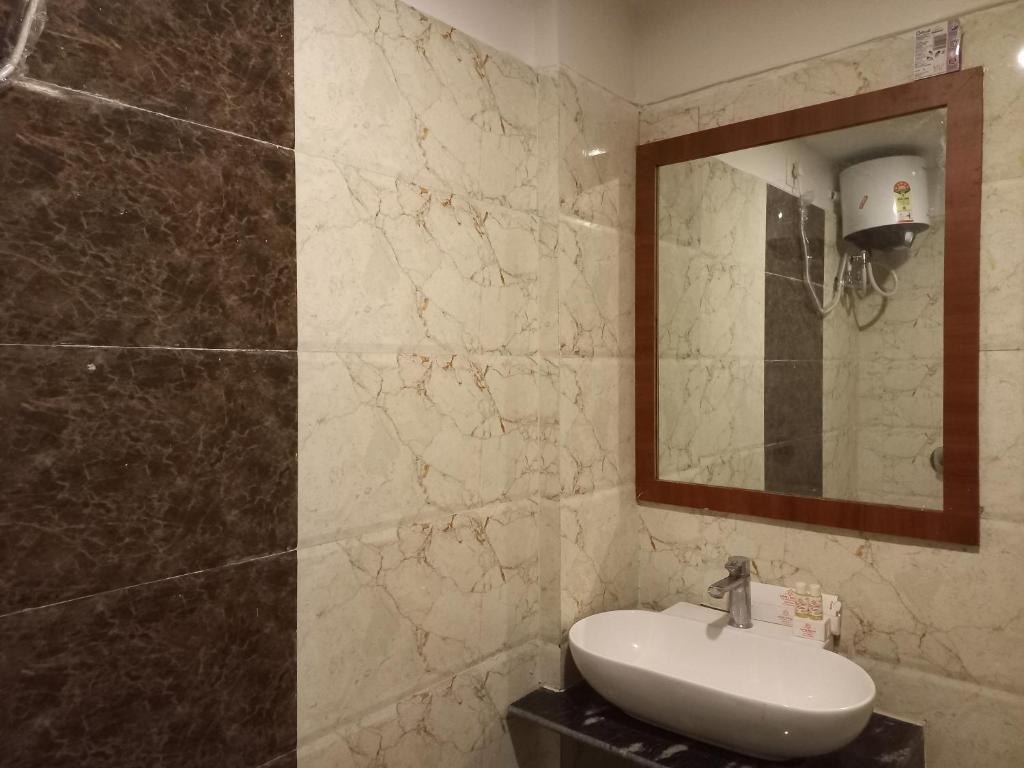 Koupelna v ubytování Hotel Ridley International