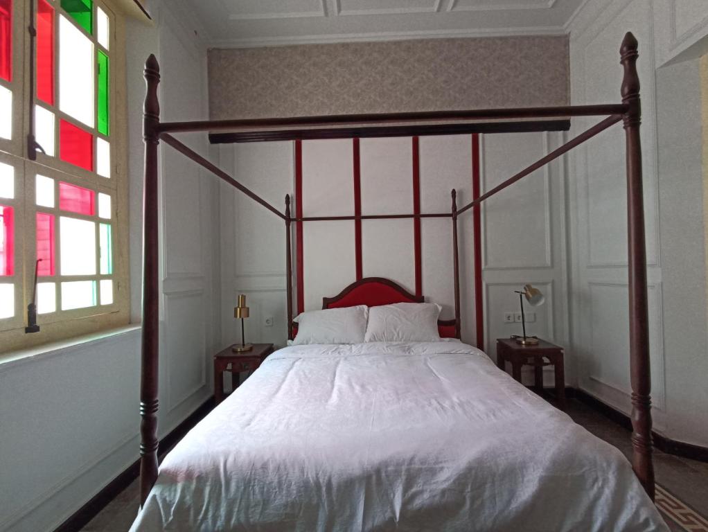Mruyung Guest House Kota Lama Banyumas Mitra RedDoorz - Chambre Deluxe