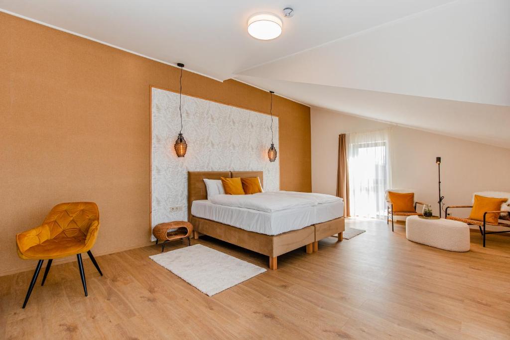 Postel nebo postele na pokoji v ubytování H11 ROOMS ESZTERGOM
