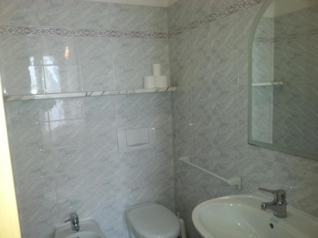 Koupelna v ubytování Hotel Marylise