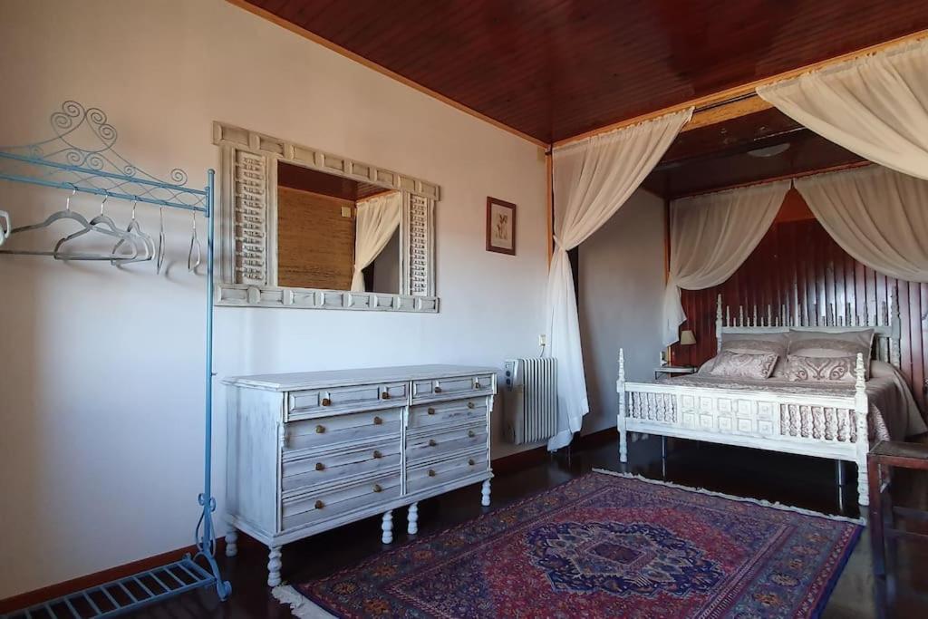 A bed or beds in a room at Cal Curpets - Bicicletas FREE