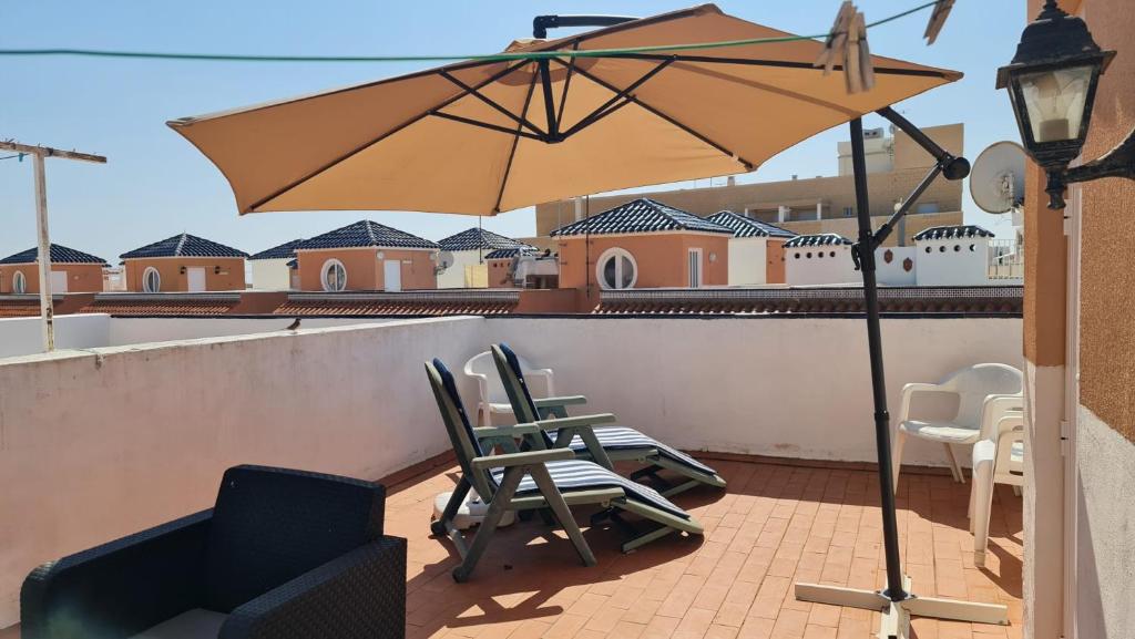 A balcony or terrace at La Mata 002-04