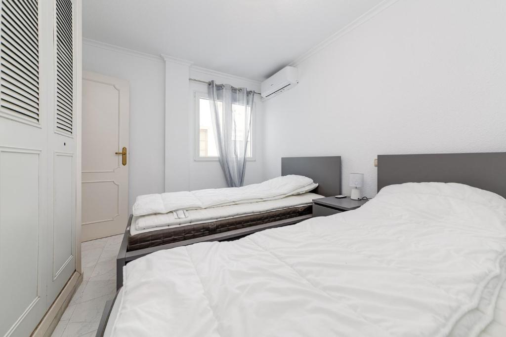 A bed or beds in a room at La Mata 002-04
