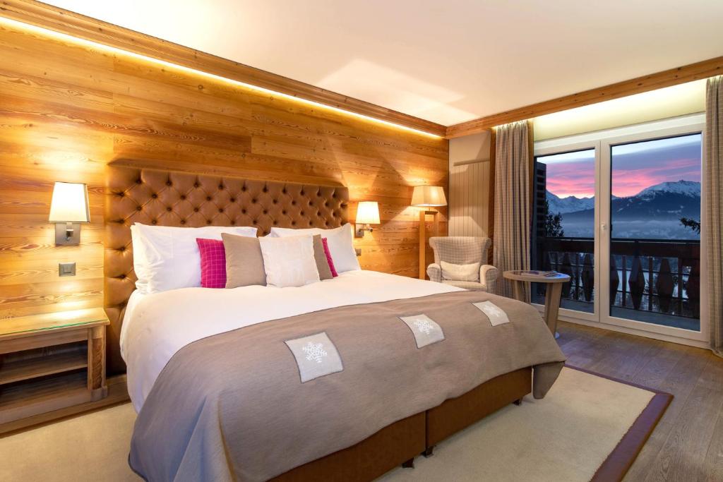 Postel nebo postele na pokoji v ubytování Hotel Royal