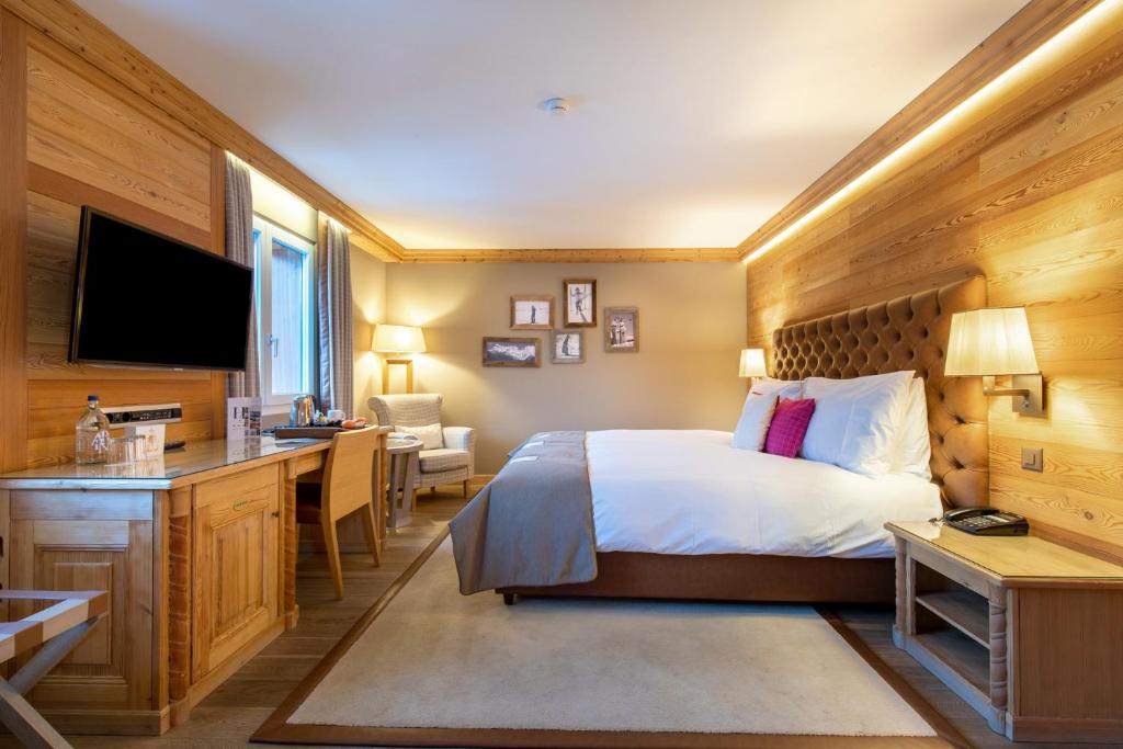 Postel nebo postele na pokoji v ubytování Hotel Royal
