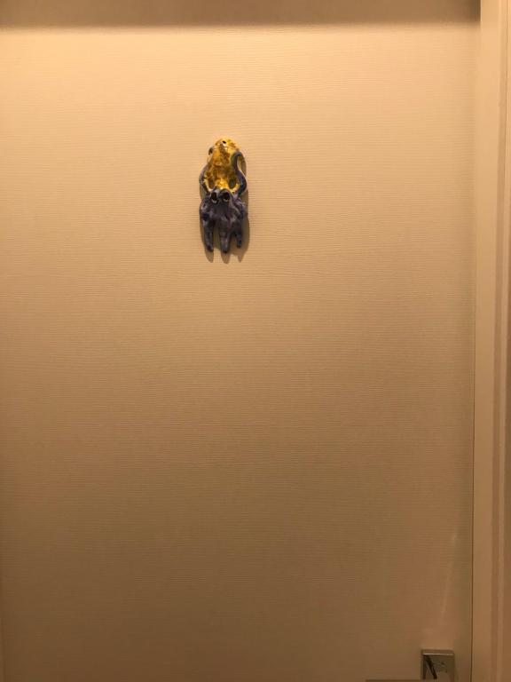 a close up of a door with a ring on it at B&B Via dell'Azzurra in Bari