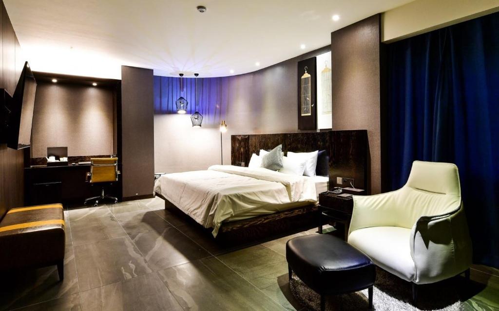 Postel nebo postele na pokoji v ubytování Hotel Ritz