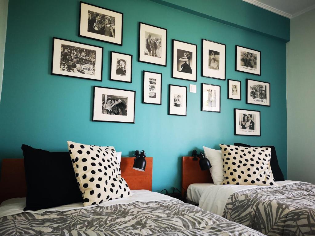 Posteľ alebo postele v izbe v ubytovaní Sea&Sun Glyfada Apartment