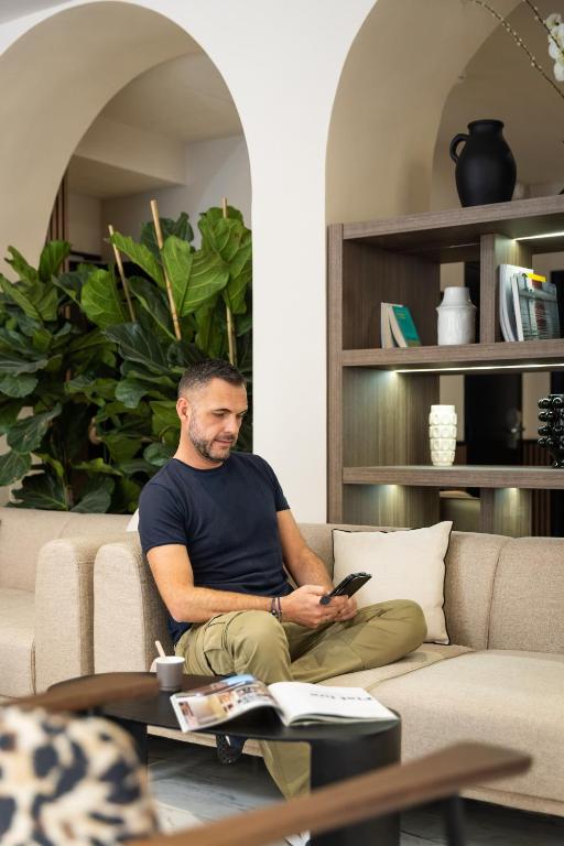 Posezení v ubytování Hotel Khla Nice