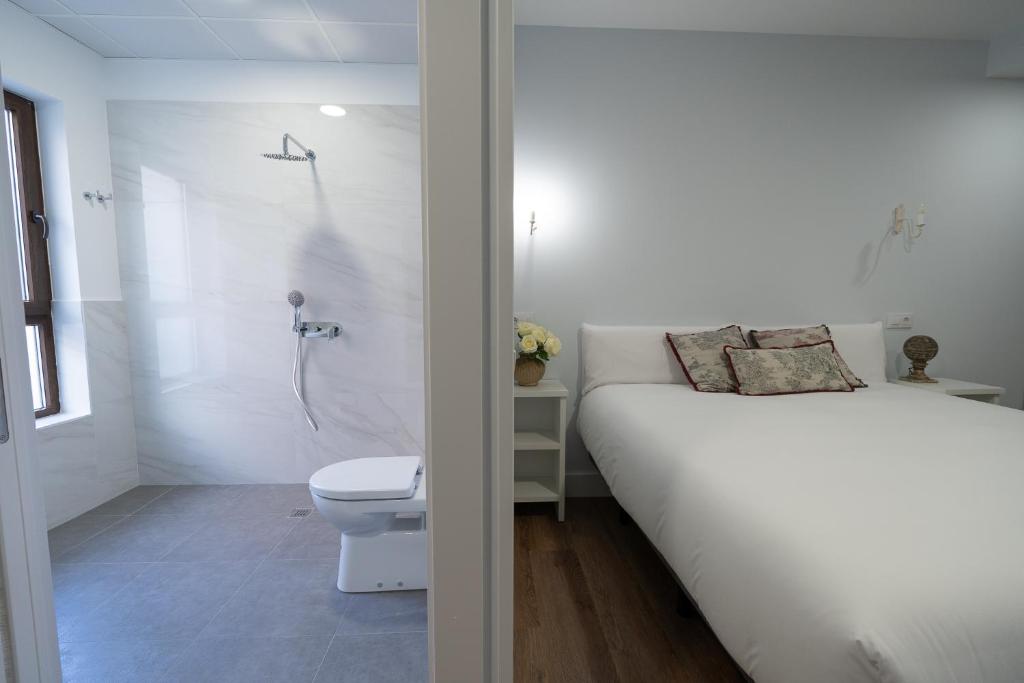 Ένα ή περισσότερα κρεβάτια σε δωμάτιο στο Center Suite Acebedos