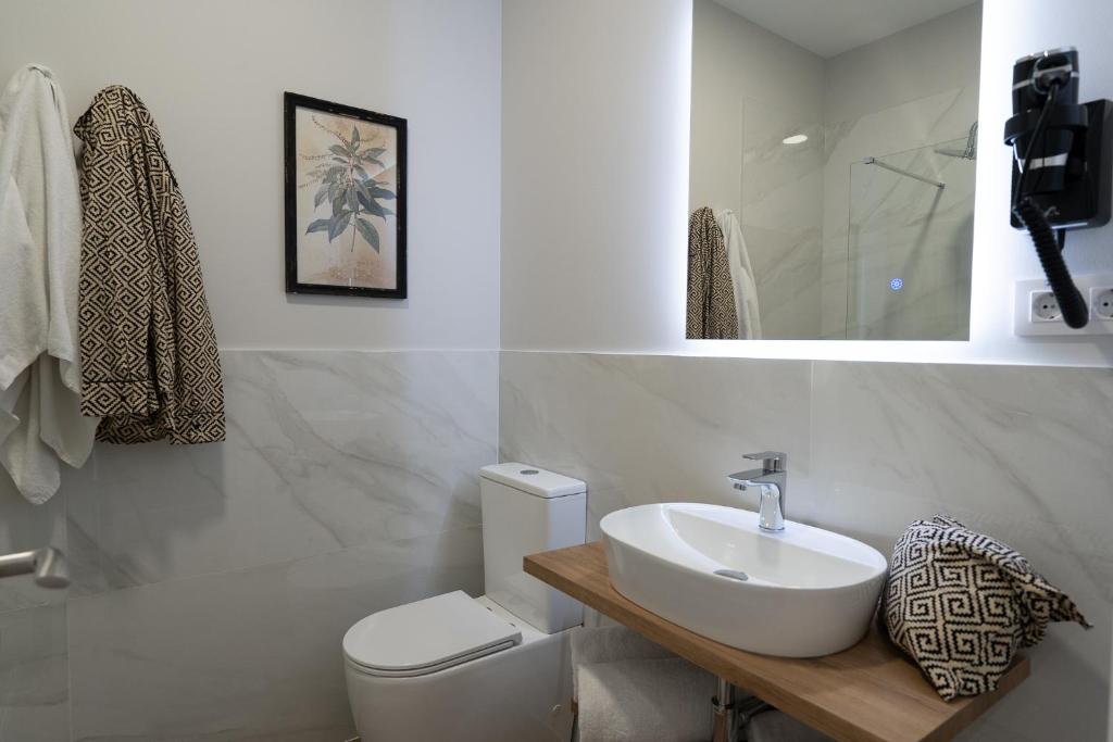 Ένα μπάνιο στο Center Suite Acebedos
