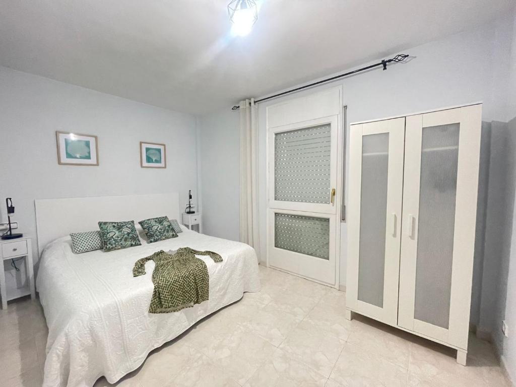 Posteľ alebo postele v izbe v ubytovaní La Casa de la Vila