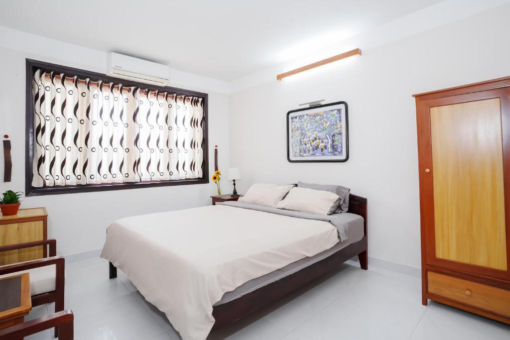 Postel nebo postele na pokoji v ubytování An Hiên Homestay Hội An