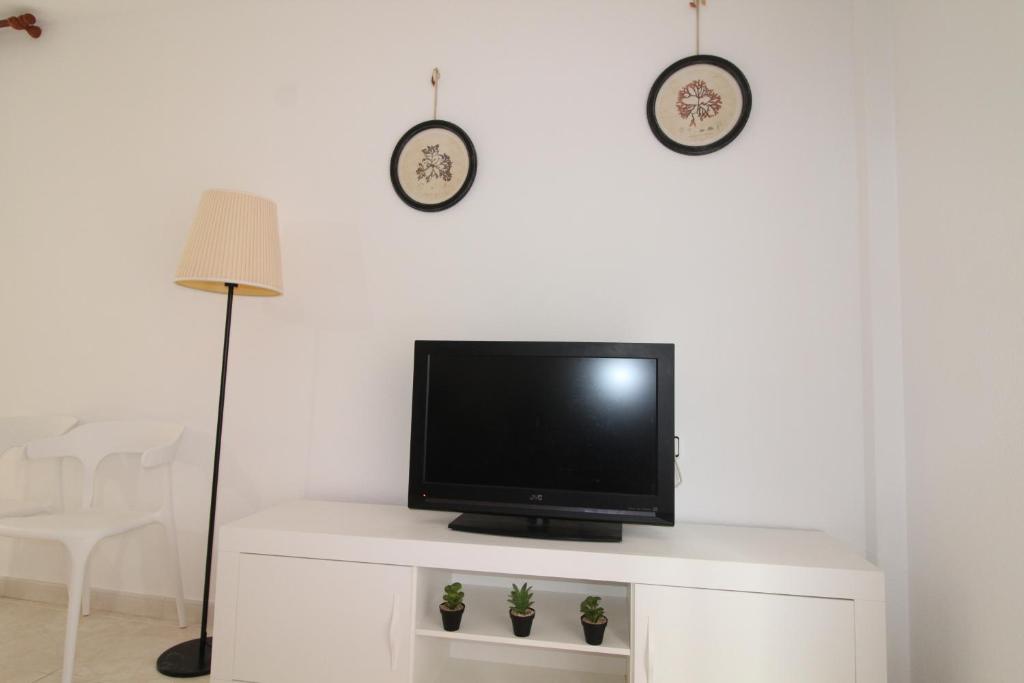 Televízia a/alebo spoločenská miestnosť v ubytovaní La Casa de la Vila