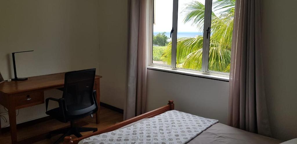Postel nebo postele na pokoji v ubytování Casa JEM