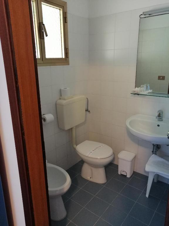 Koupelna v ubytování Hotel Trifoglio