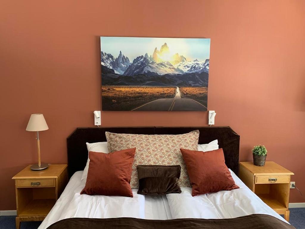 Postel nebo postele na pokoji v ubytování Honne Hotell