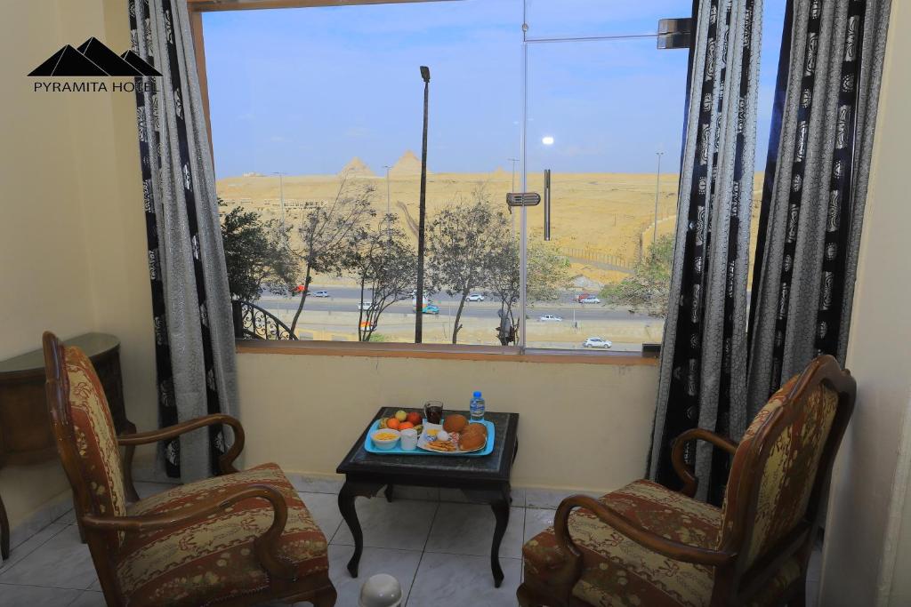 Posezení v ubytování Pyramita Hotel