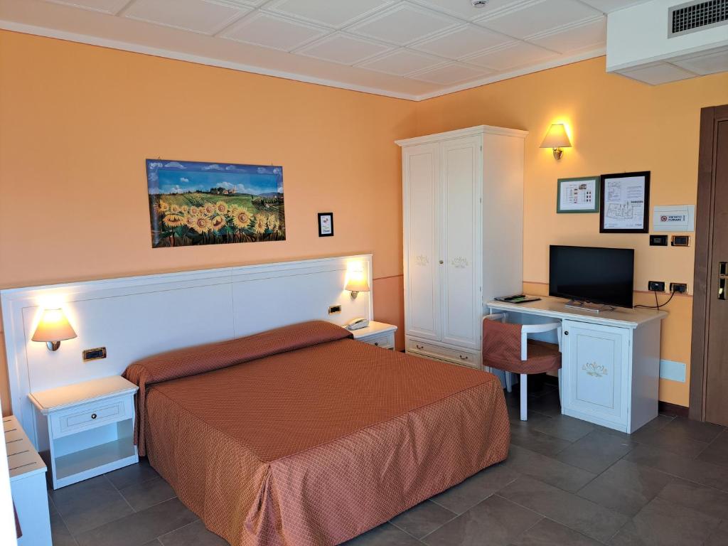 Postel nebo postele na pokoji v ubytování Hotel Azalea