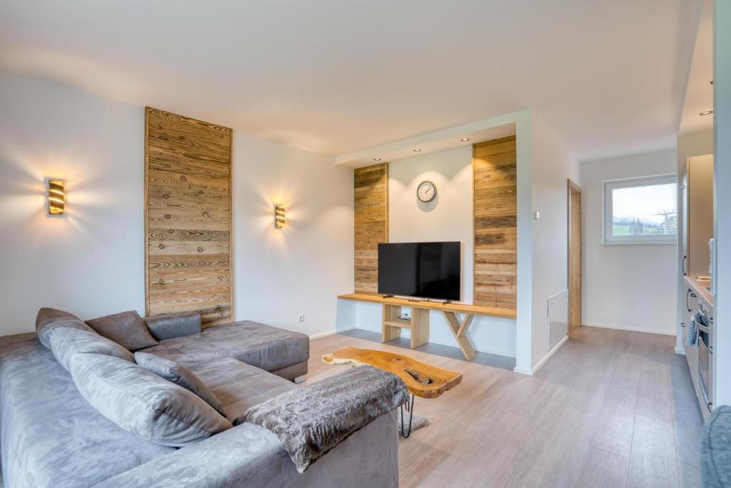 TV a/nebo společenská místnost v ubytování Natur Residenz Bad Häring