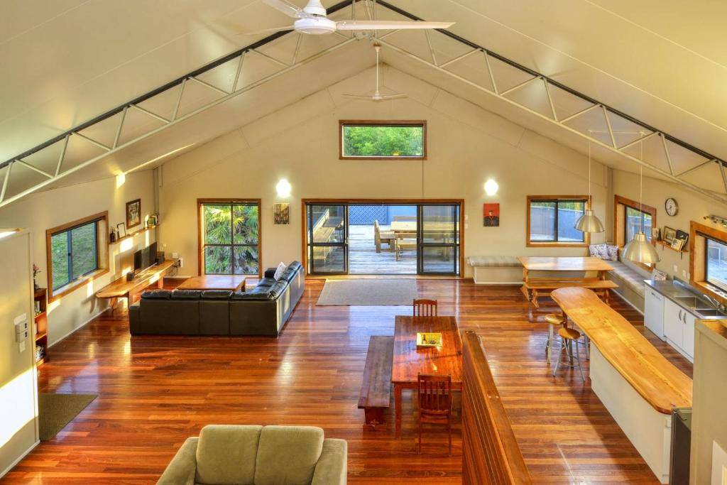 an open living room and dining room of a house at THE BARN in Mahia