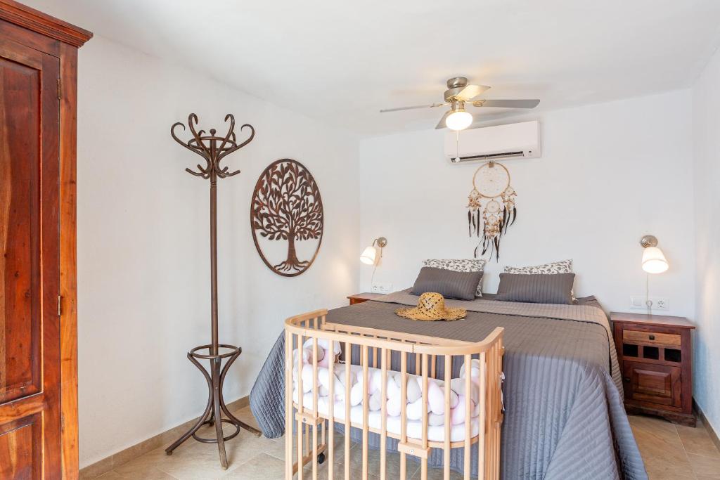 Postel nebo postele na pokoji v ubytování Villa Casa Pollino in Lloret de Mar