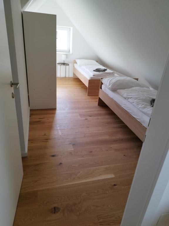Postel nebo postele na pokoji v ubytování Krems am Campus