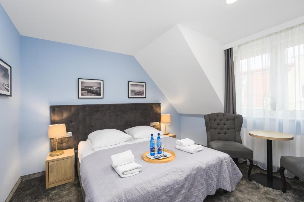 Posteľ alebo postele v izbe v ubytovaní Monte Carlo Apartments by OneApartments