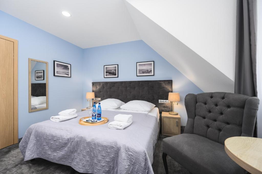 Posteľ alebo postele v izbe v ubytovaní Monte Carlo Apartments by OneApartments