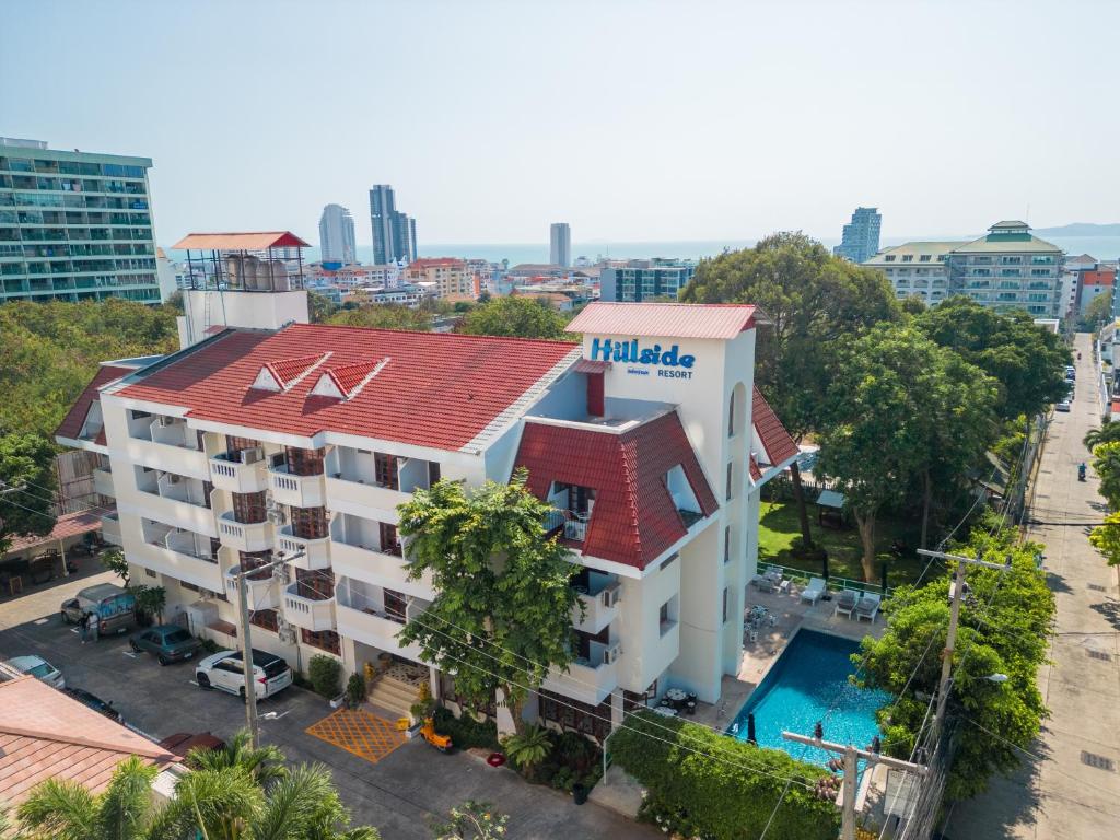 an aerial view of a hotel with a swimming pool at Hillside Resort in Pattaya Central